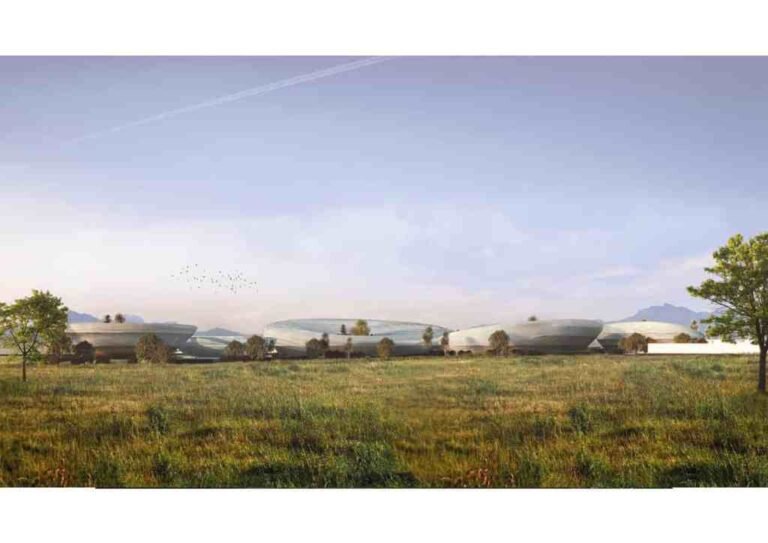 INJ Architects wide exterior rendering of low curving white architectural structures scattered across a lush green field under a clear daylight sky