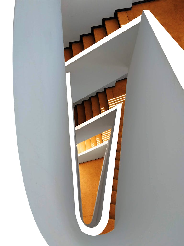 High-angle view of a modern spiral staircase showcasing sleek design.