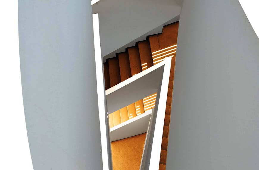 High-angle view of a modern spiral staircase showcasing sleek design.