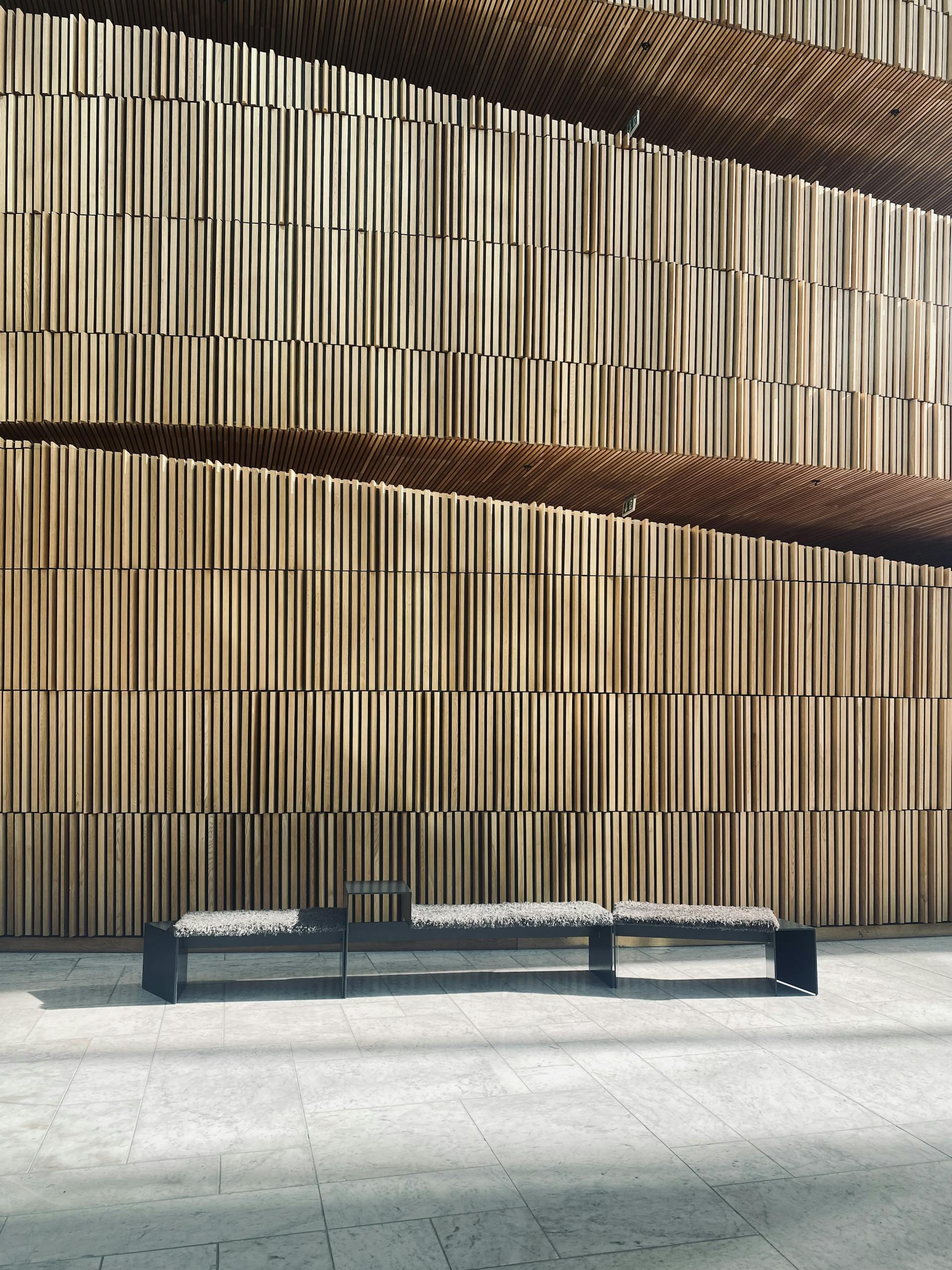 Minimalist interior featuring wooden slatted walls in Oslo Opera House.