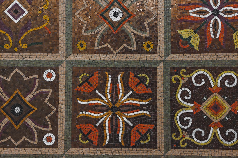 Detailed mosaic pattern with colorful geometric and floral motifs.