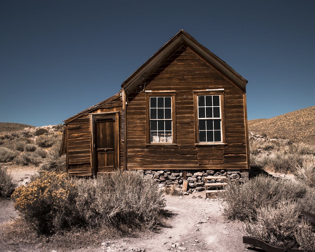 Explore this rustic wooden cabin amid the arid landscape of Bridgeport, California.