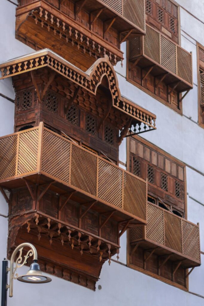 Explore traditional woodwork on a multi-storey building, showcasing cultural architecture.