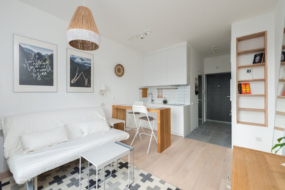 Bright and cozy living space featuring modern furniture and decor. Ideal for residential inspiration.