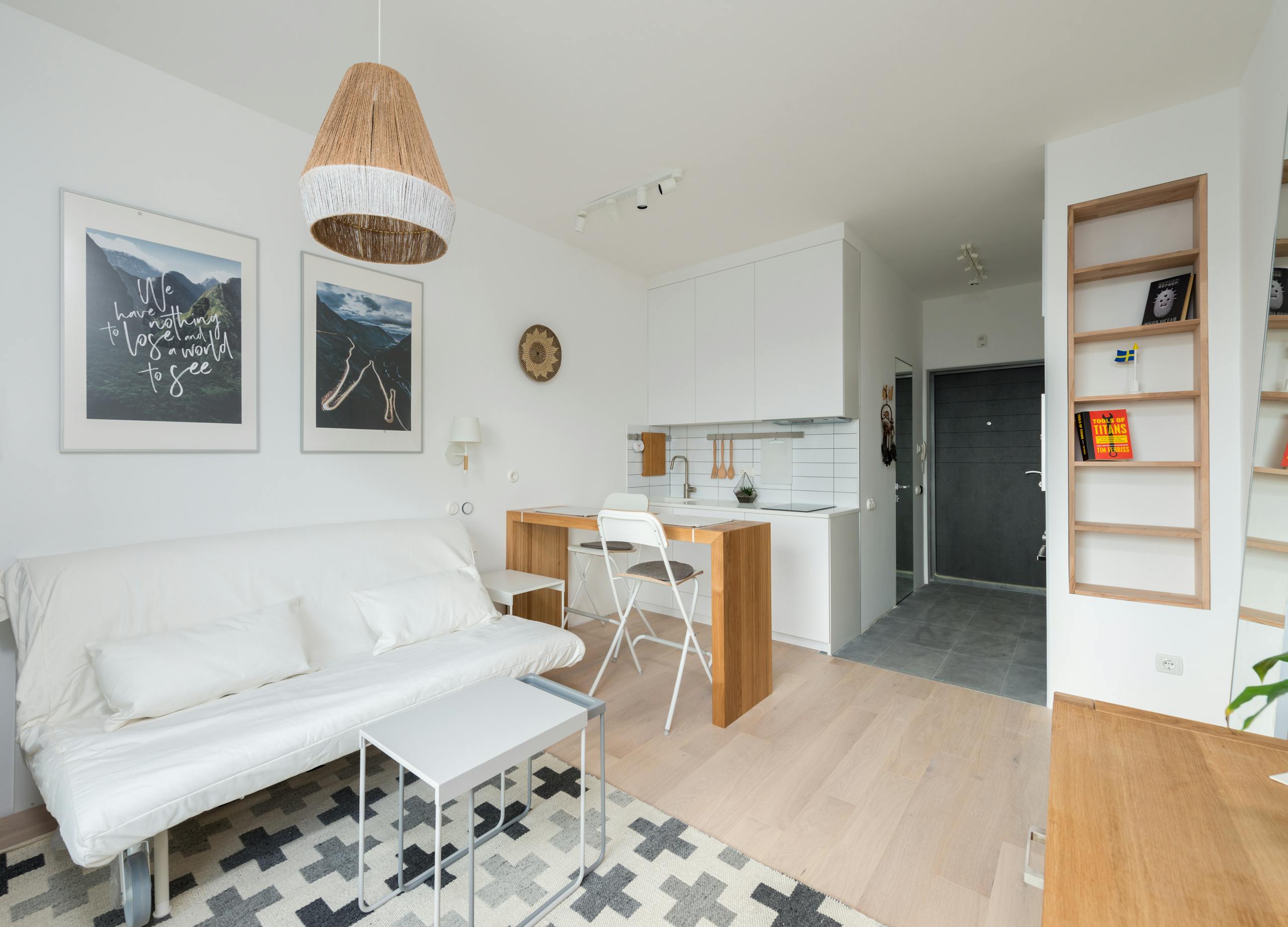 Bright and cozy living space featuring modern furniture and decor. Ideal for residential inspiration.