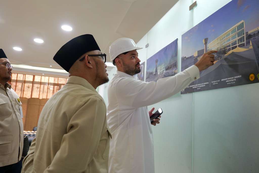 Principal Architect Ibrahim Joharji presenting the architectural renderings of the new Indonesian Consulate to the Consul General, highlighting the facade design and security features.