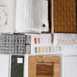 Assorted fabric and textile samples with color swatches for design inspiration.