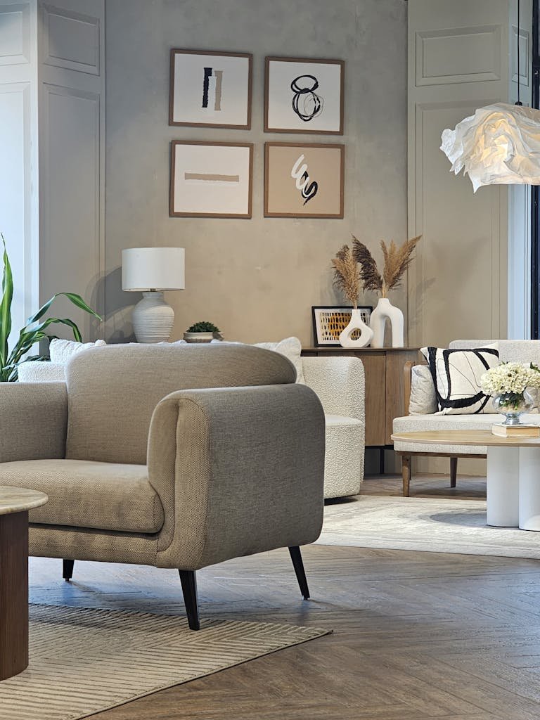 Elegant modern living room featuring stylish furniture and minimalist decor design.