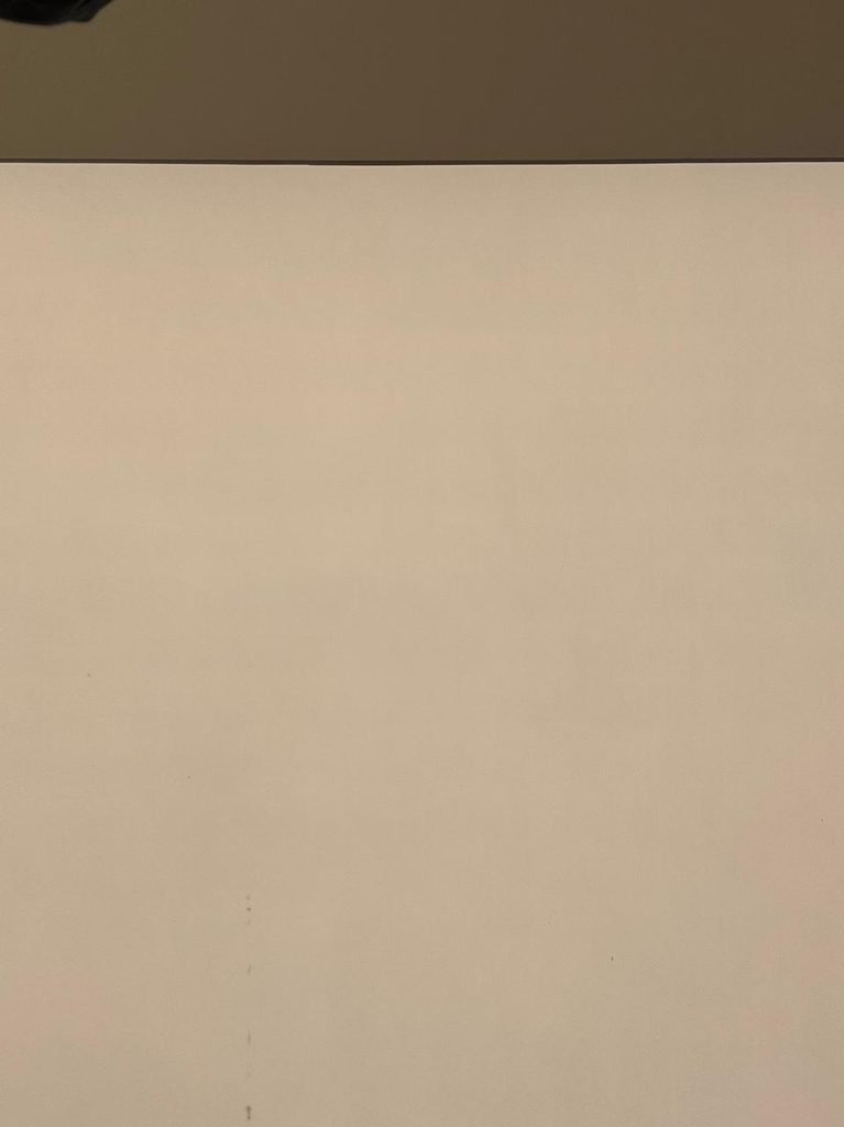 Minimalist orthographic view looking up at a flat, warm-toned beige plaster ceiling plane with subtle tonal lighting gradient and clean edge boundary.