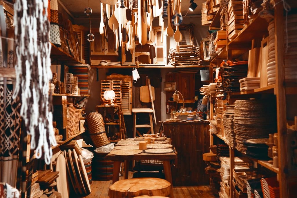Explore a cozy shop filled with wooden crafts and home supplies.